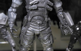 Square-enix-play-arts-kai-deus-ex-human-revolution-barret-toy-fair-2011_480_poster